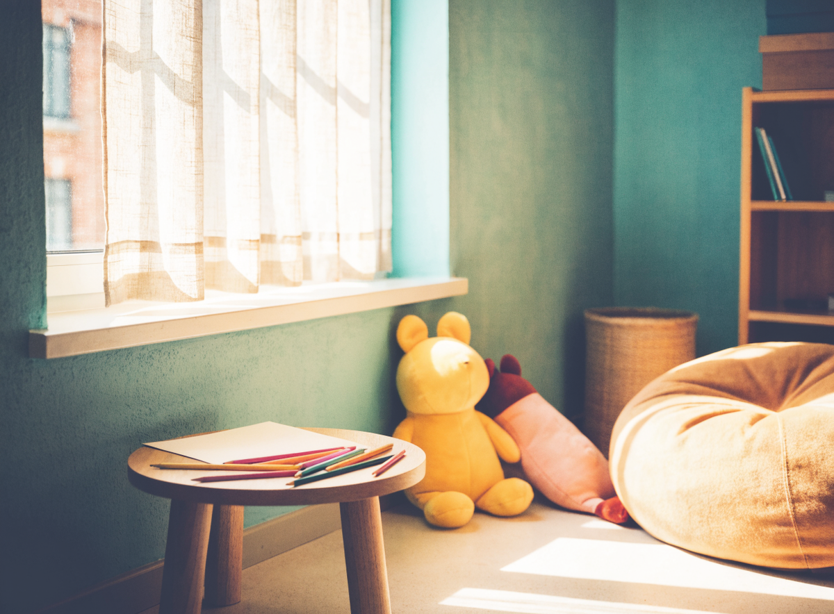 Child-friendly corner of a counseling office with pencils and paper
